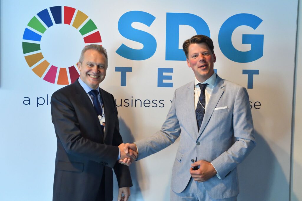 The CEO of JBS Gilberto Tomazoni (left) and the CEO of IDH Daan Wensing (right) at the Sustainable Development Goals (SDG) tent at the World Economic Forum in Davos, Switzerland