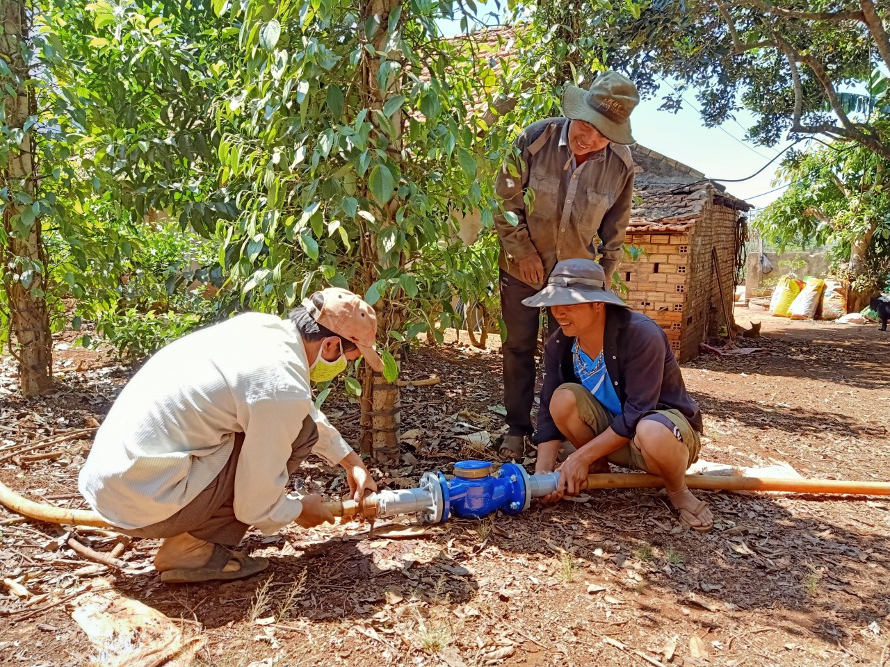 Agriteam-installing-water-meter.jpg